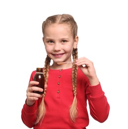 Photo of Cute girl taking syrup from dosing spoon on white background
