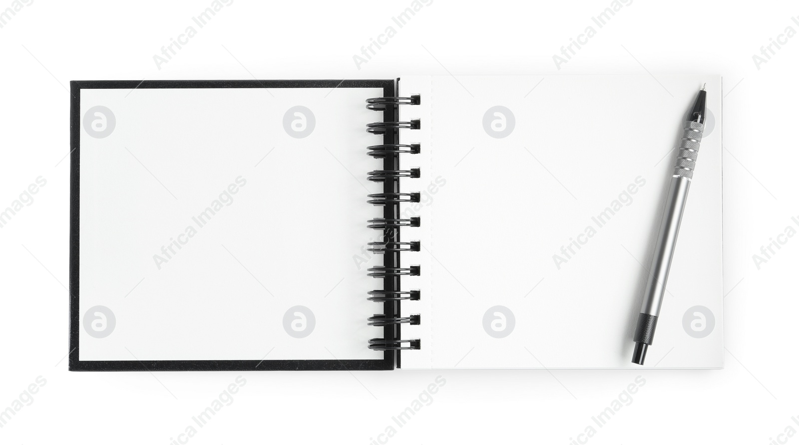 Photo of One notebook and pen isolated on white, top view