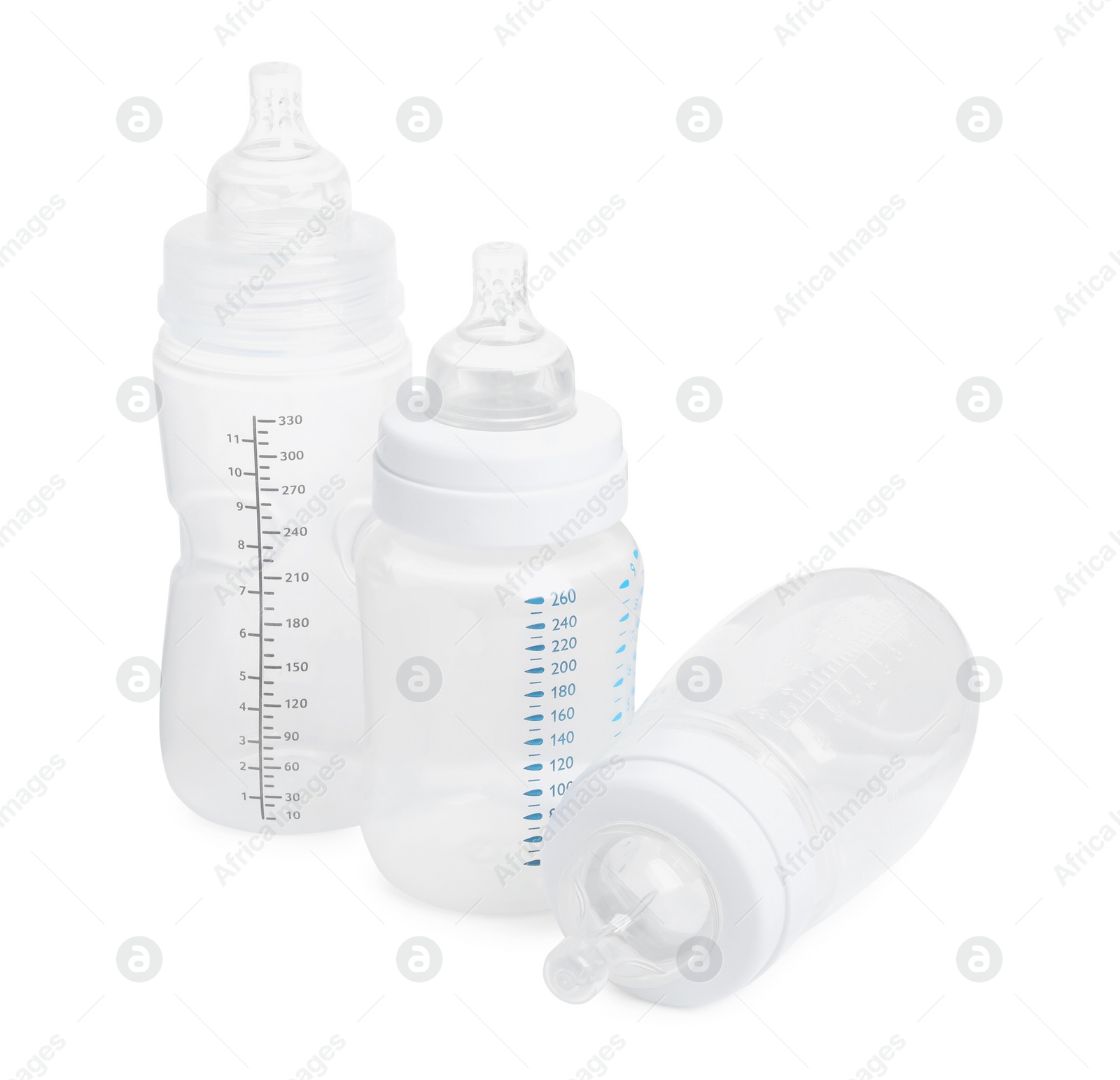 Photo of Three empty feeding bottles for infant formula on white background