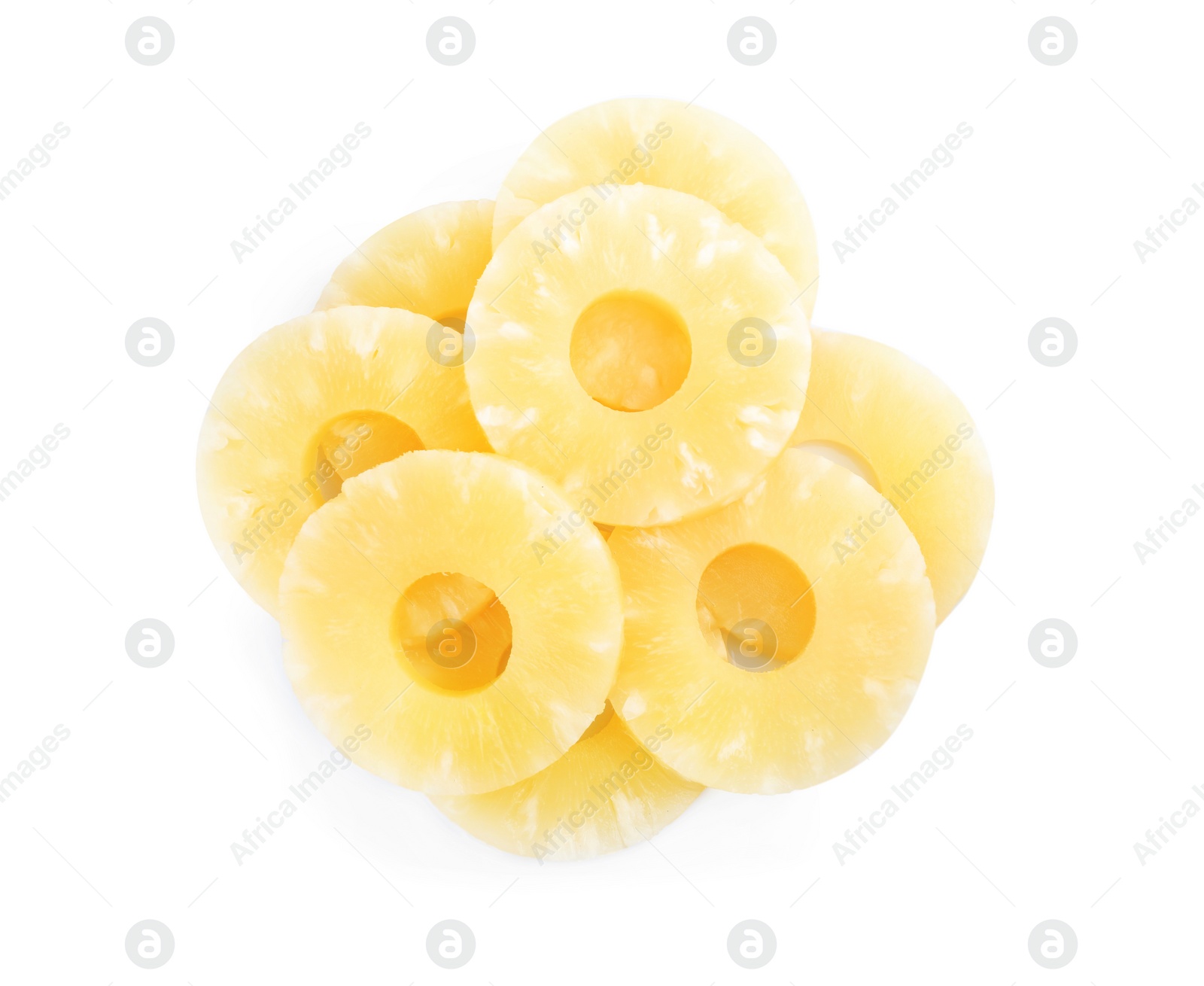 Photo of Delicious canned pineapple rings on white background, top view