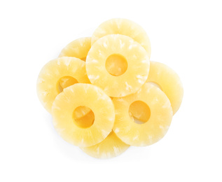 Photo of Delicious canned pineapple rings on white background, top view