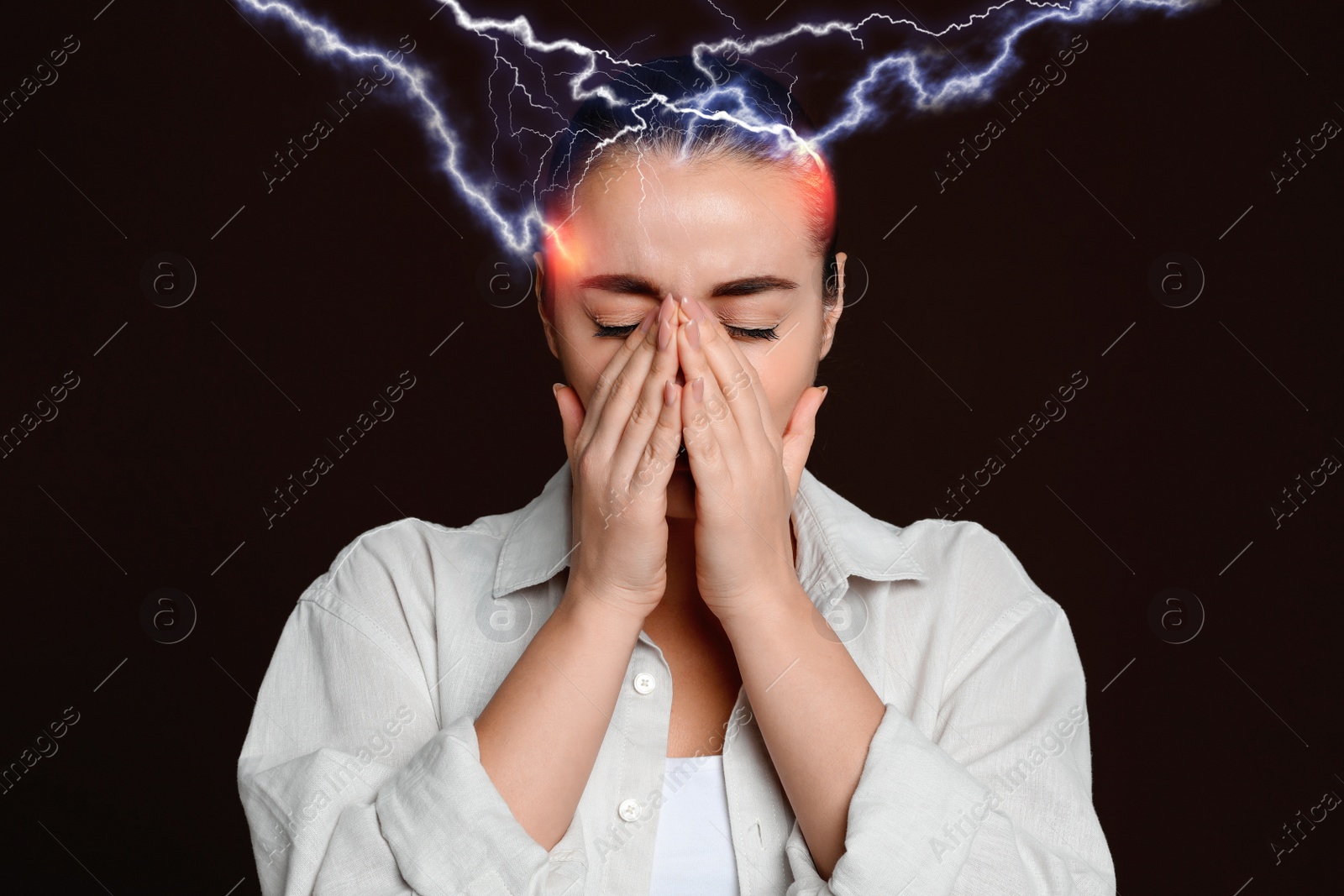 Image of Young woman having headache on brown background. Illustration of lightnings representing severe pain