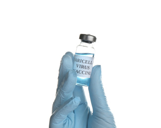 Doctor holding chickenpox vaccine on white background, closeup. Varicella virus prevention