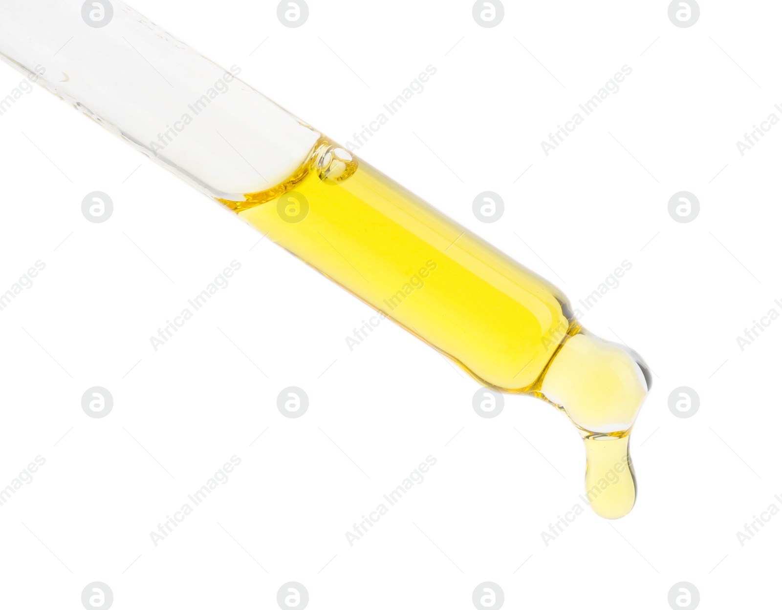 Photo of Dripping tincture from pipette isolated on white