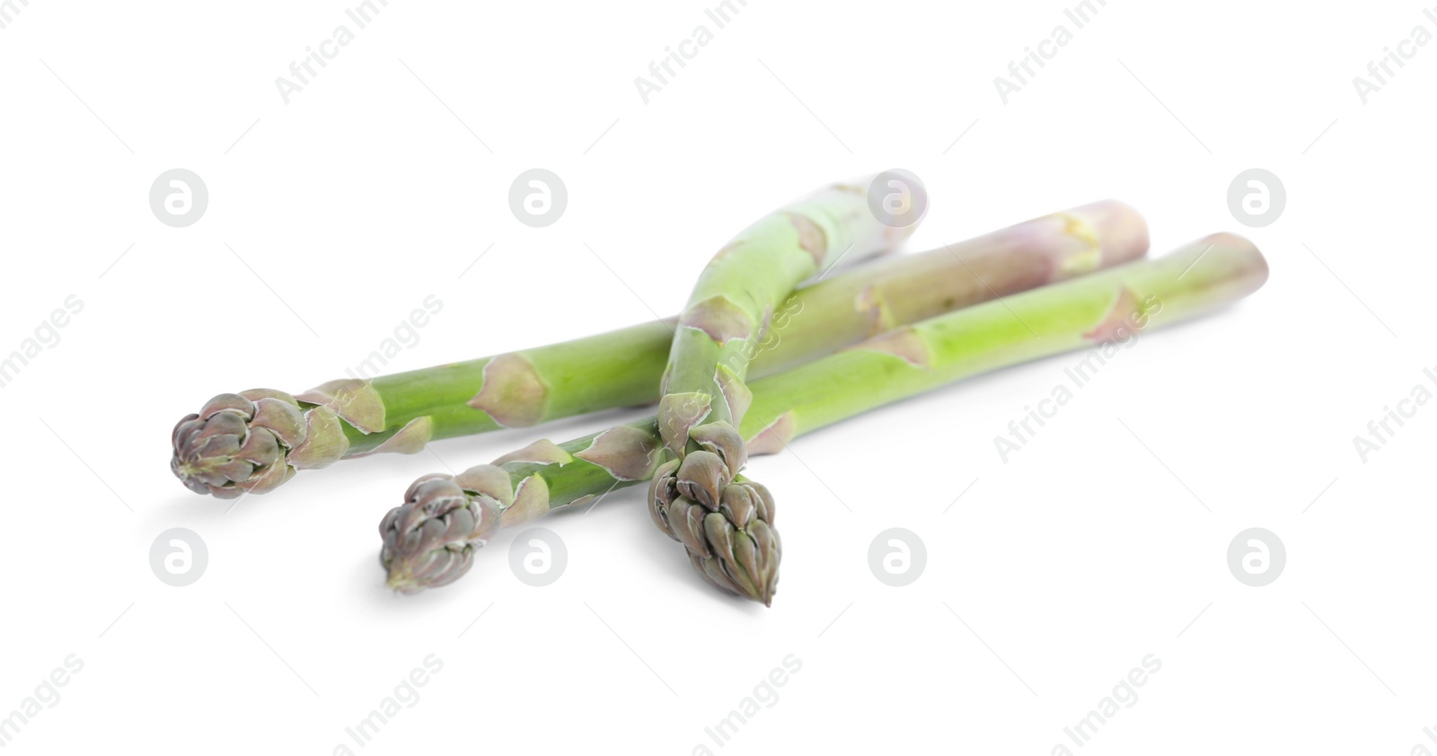 Photo of Fresh raw asparagus isolated on white. Healthy eating