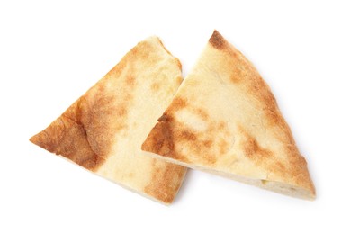 Cut fresh pita bread on white background