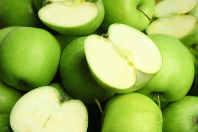 Photo of Fresh ripe green apples as background, closeup view