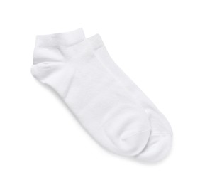 Photo of Pair of socks isolated on white, top view