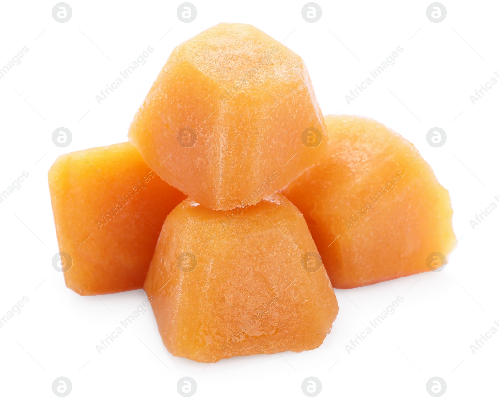 Photo of Frozen fruit puree cubes on white background