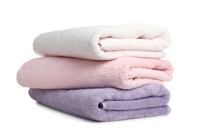 Folded soft terry towels on white background