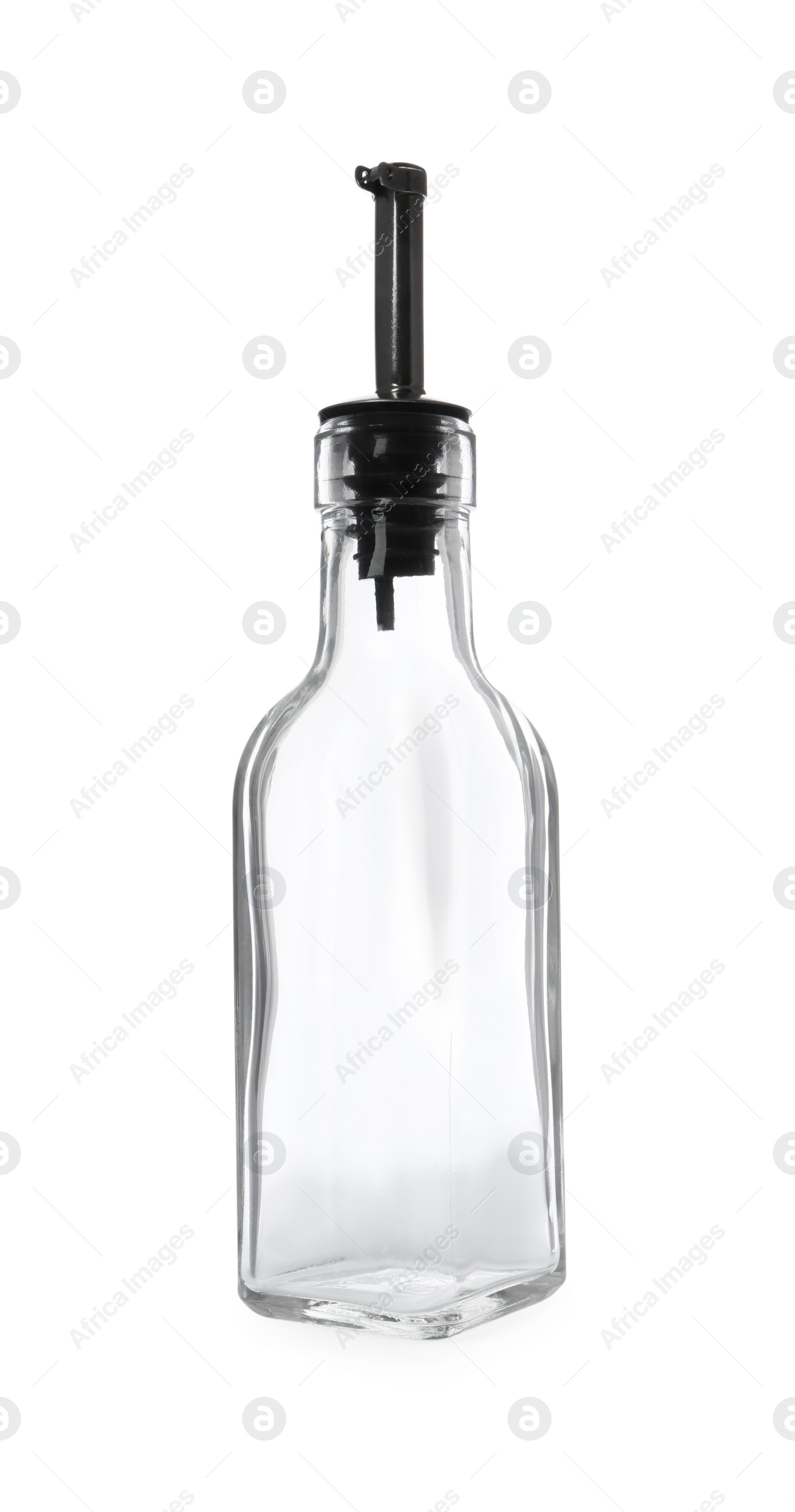 Photo of Empty glass bottle with pump for oil on white background