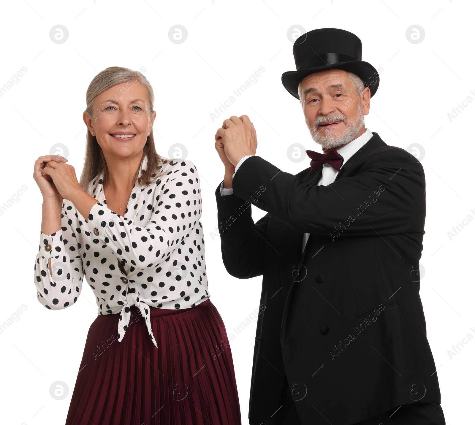 Photo of Senior couple dancing together on white background