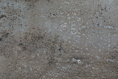 Texture of grey stone surface as background, closeup