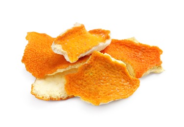 Pile of dry orange peels on white background, top view