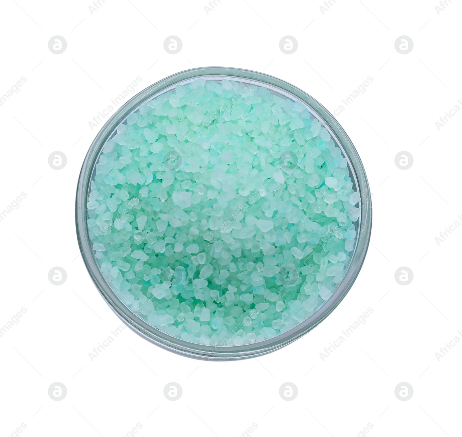 Photo of Bowl with turquoise sea salt isolated on white, top view