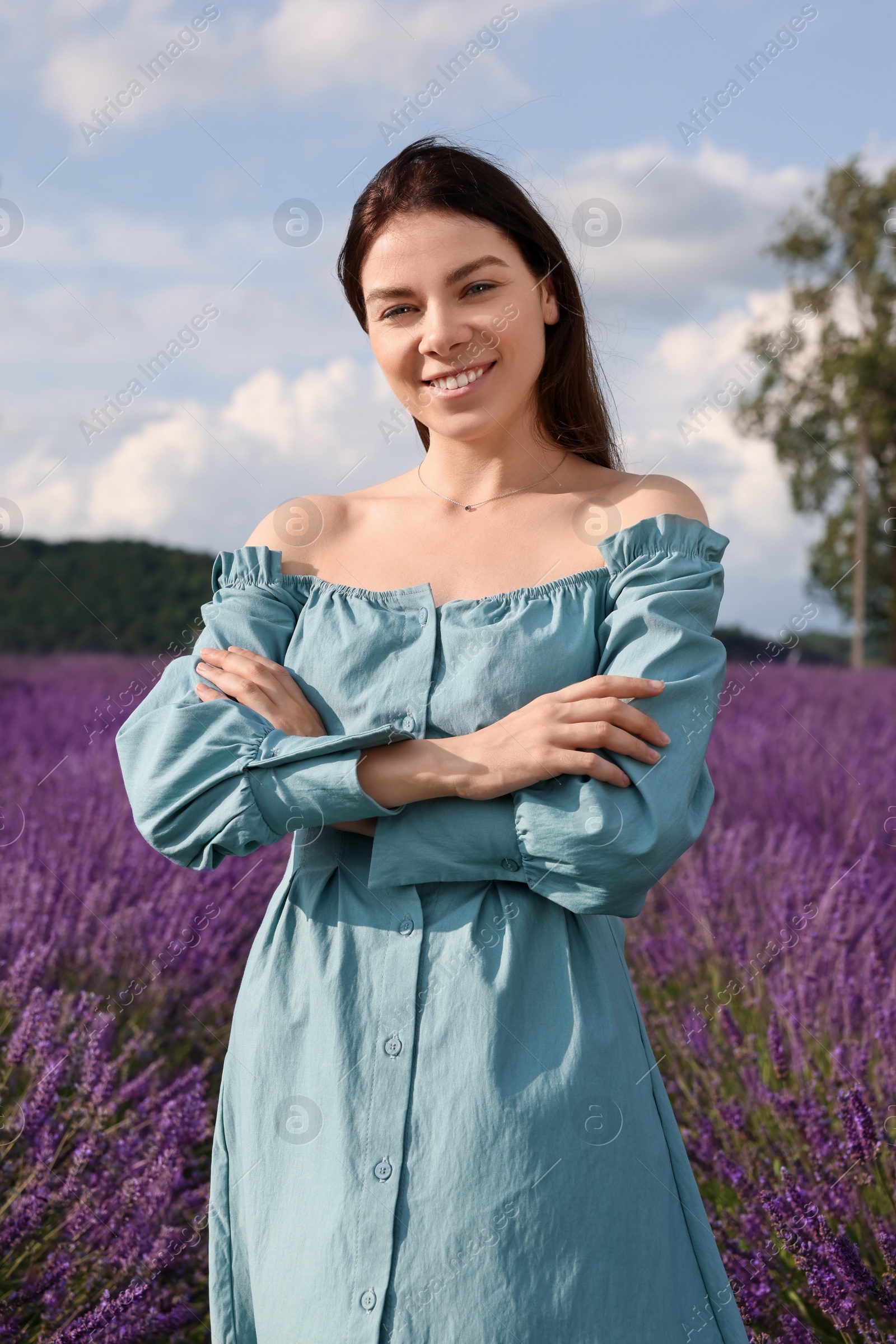 Photo of Portrait of smiling woman in lavender field