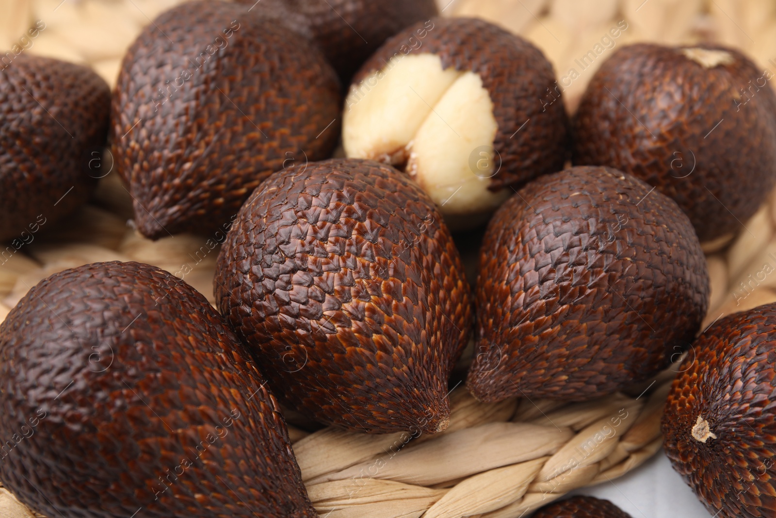 Photo of Many fresh salak fruits on table, closeup