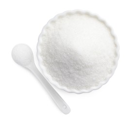 Photo of Granulated sugar in bowl and spoon isolated on white, top view