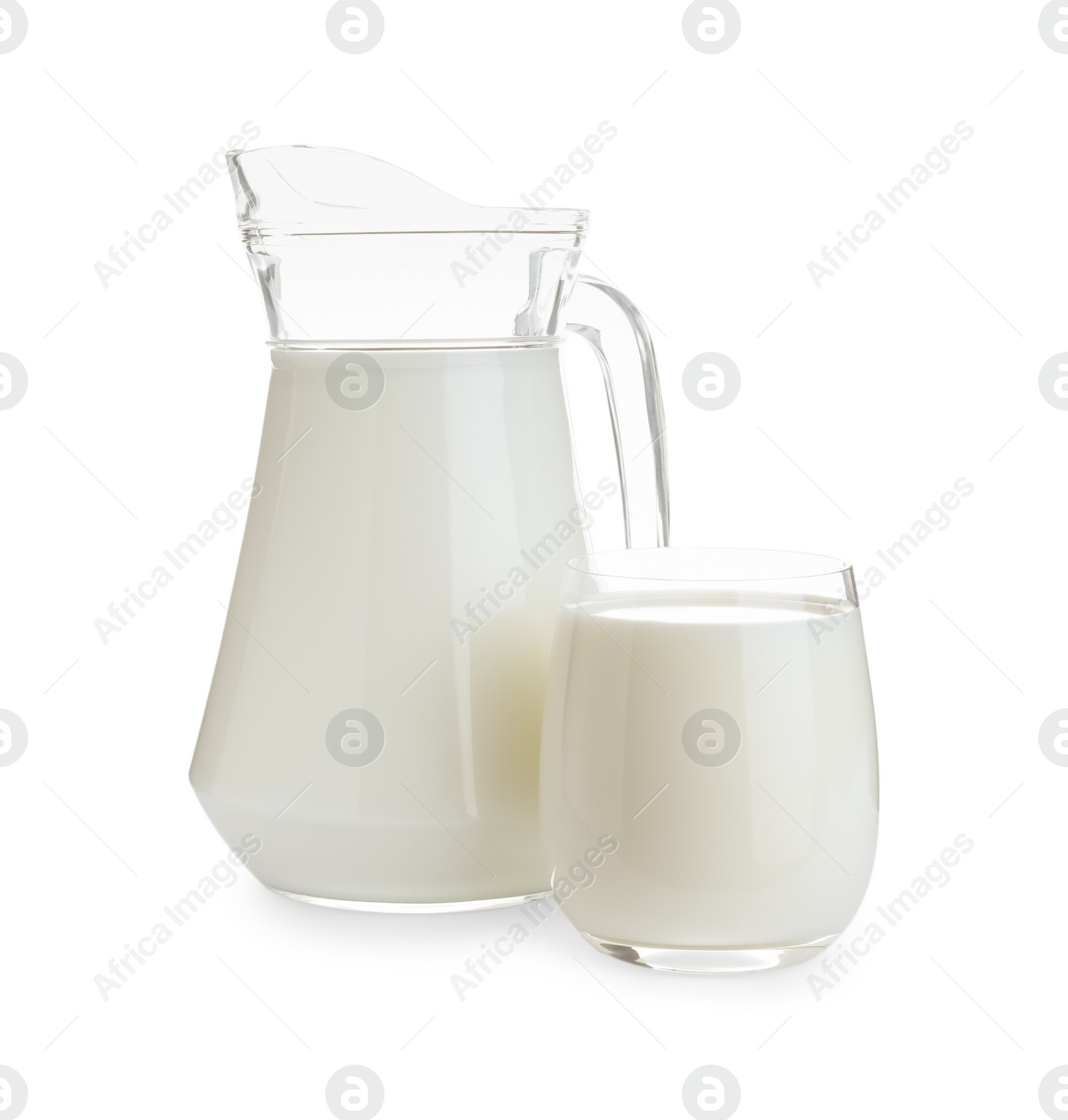 Photo of Jug and glass with fresh milk on white background