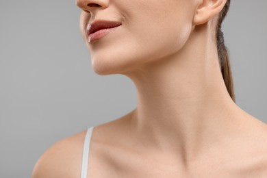 Photo of Beauty concept. Woman on grey background, closeup