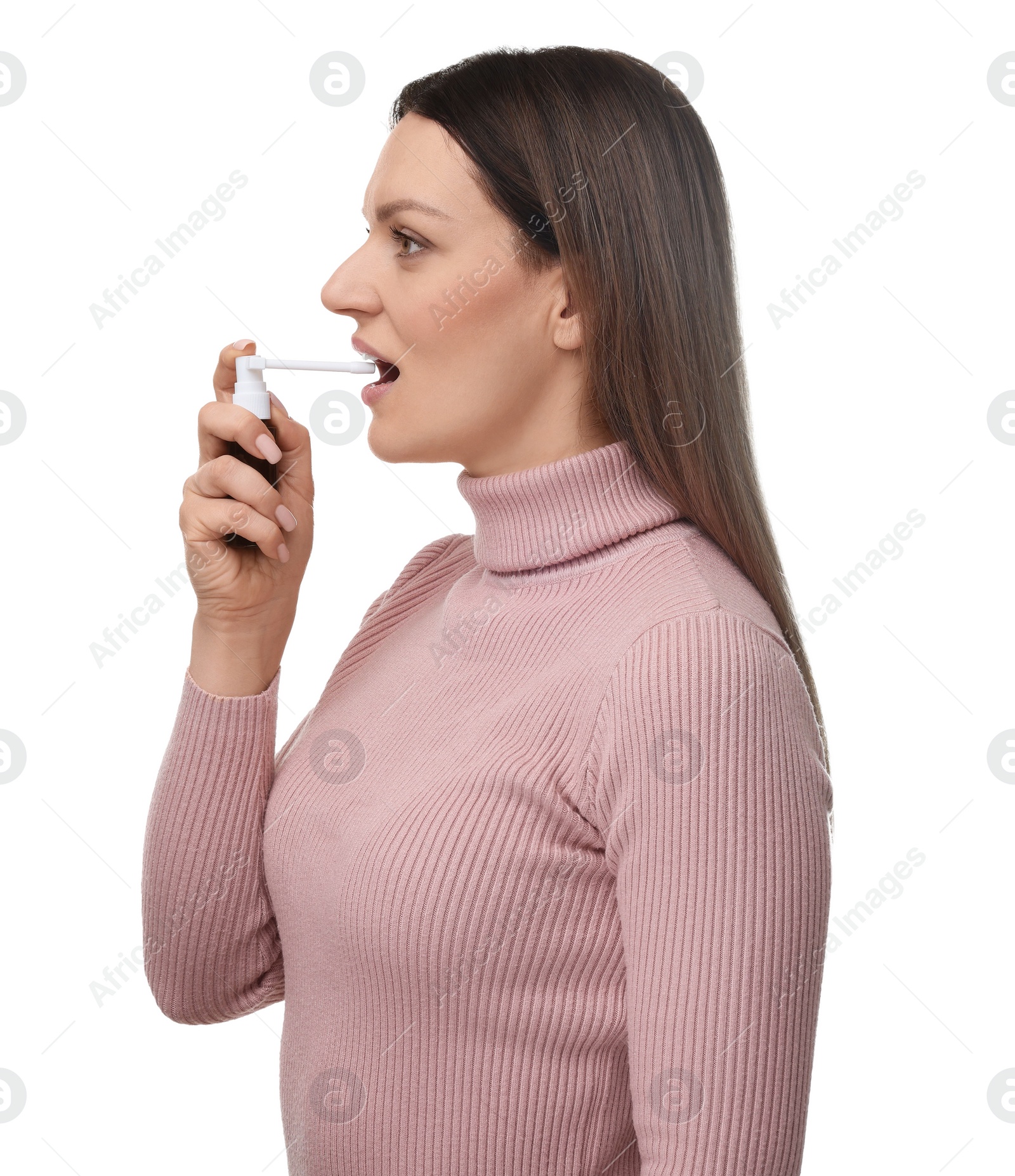 Photo of Woman using throat spray on white background