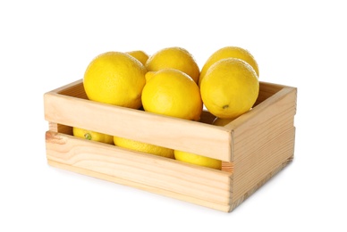 Wooden crate full of fresh lemons on white background