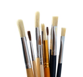 Photo of Set of different paint brushes on white background
