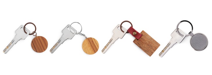 Image of Set of keys with key chains isolated on white