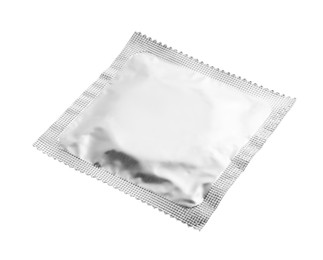 Photo of Condom package isolated on white. Safe sex
