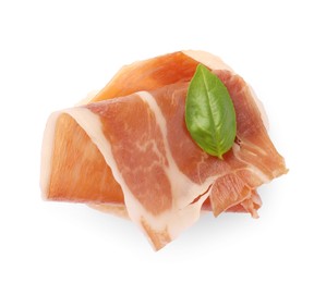 Tasty sandwich with cured ham and basil leaf isolated on white, top view
