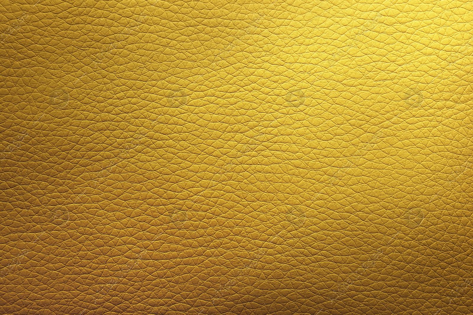 Image of Golden textured surface as background, closeup view