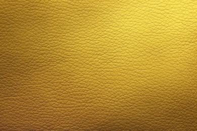 Image of Golden textured surface as background, closeup view