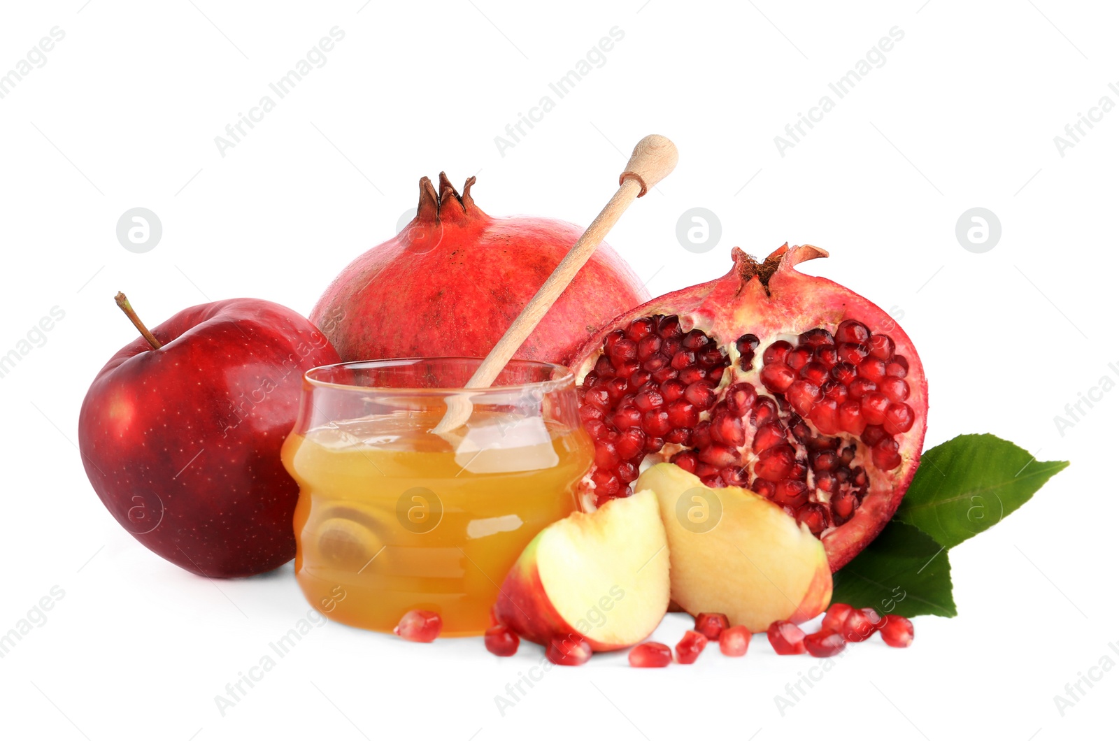 Photo of Honey, apples and pomegranate on white background. Rosh Hashanah holiday