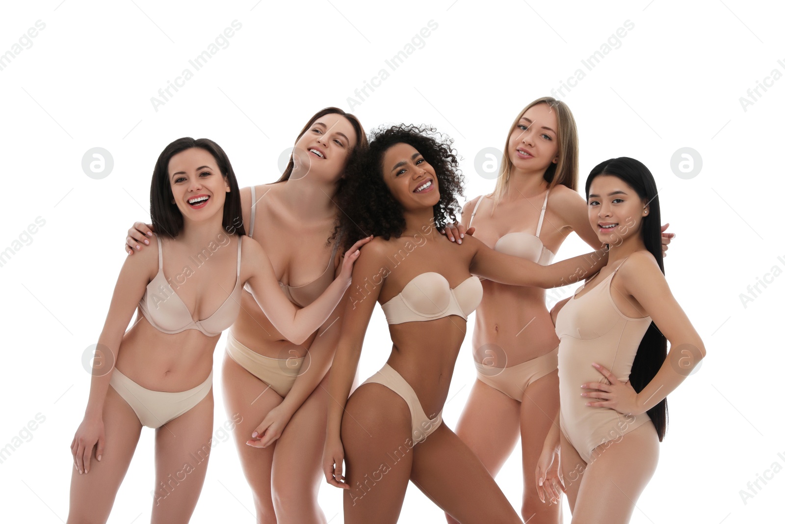 Photo of Group of women with different body types in underwear on white background