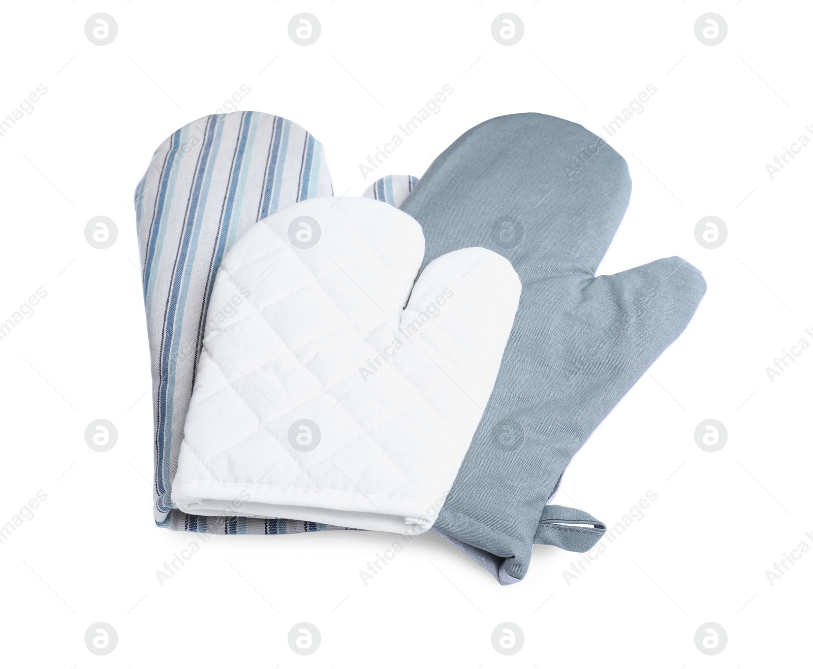 Photo of Set of oven gloves for hot dishes on white background