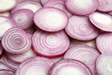 Photo of Ripe red onions as background