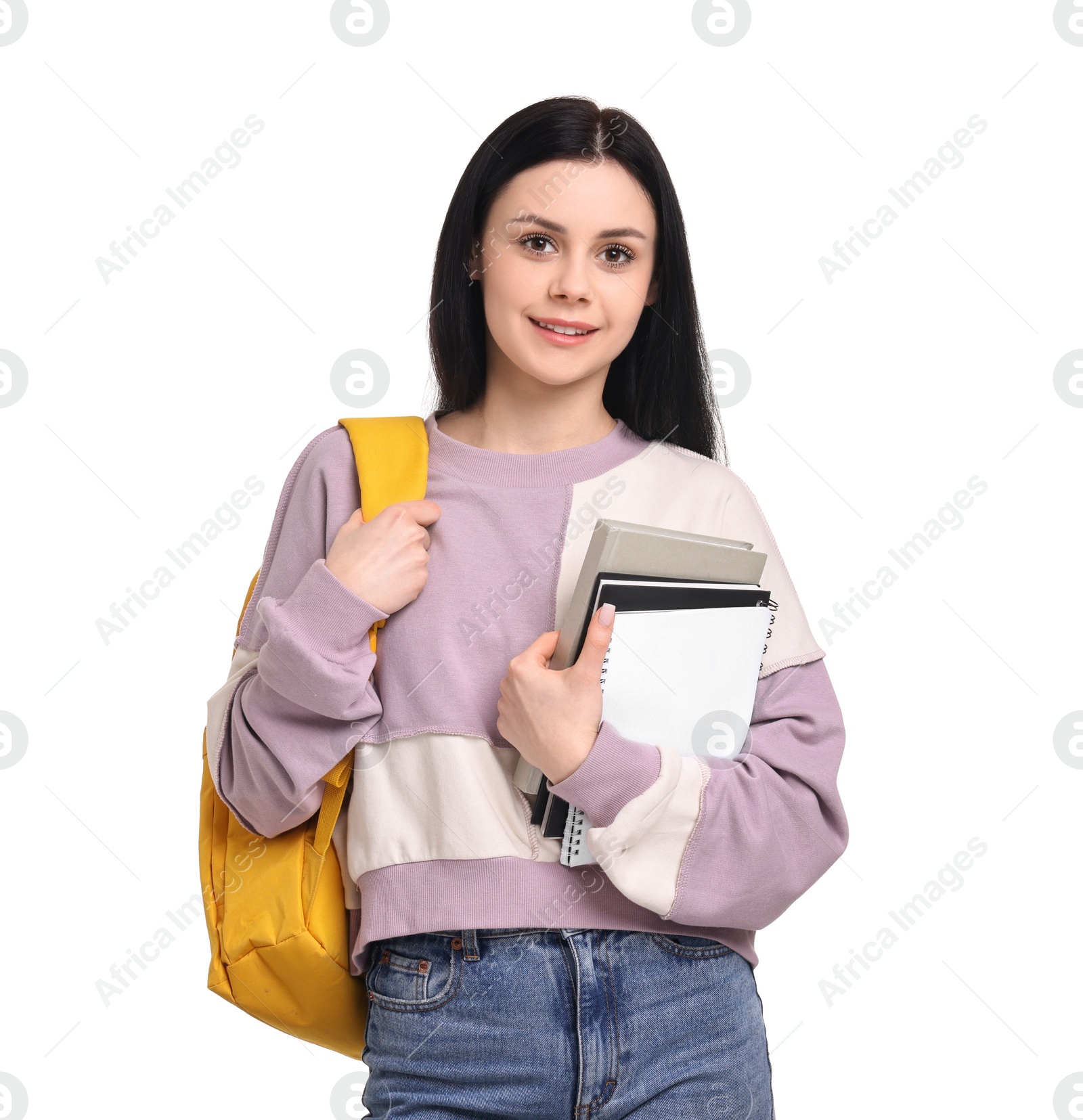 Photo of Smiling student with notebooks and backpack on white background