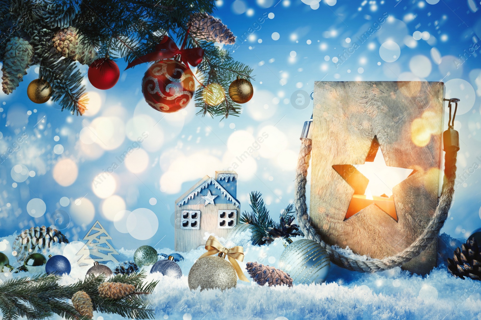 Image of Composition with wooden Christmas lantern on snow against color background. Bokeh effect