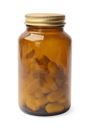 Photo of Bottle with vitamin capsules isolated on white