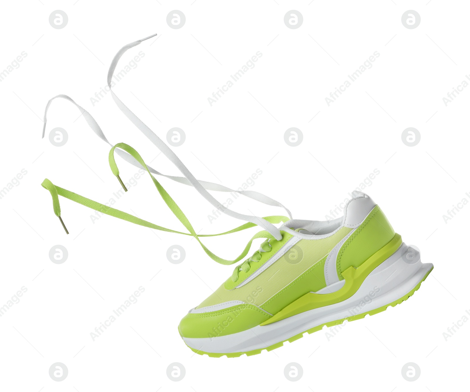 Photo of One stylish light green sneaker isolated on white