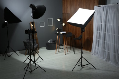 Photo of Example of living room interior design and professional equipment in photo studio