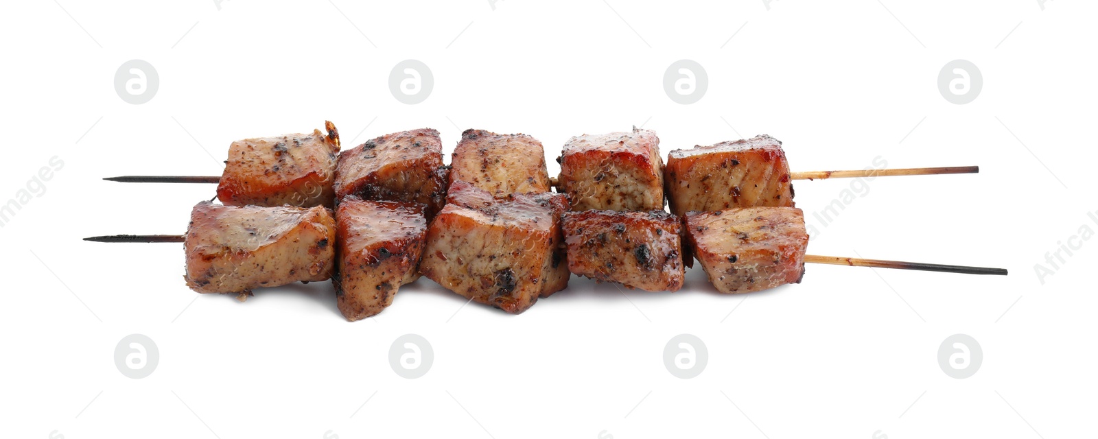 Photo of Skewers with delicious shish kebabs isolated on white