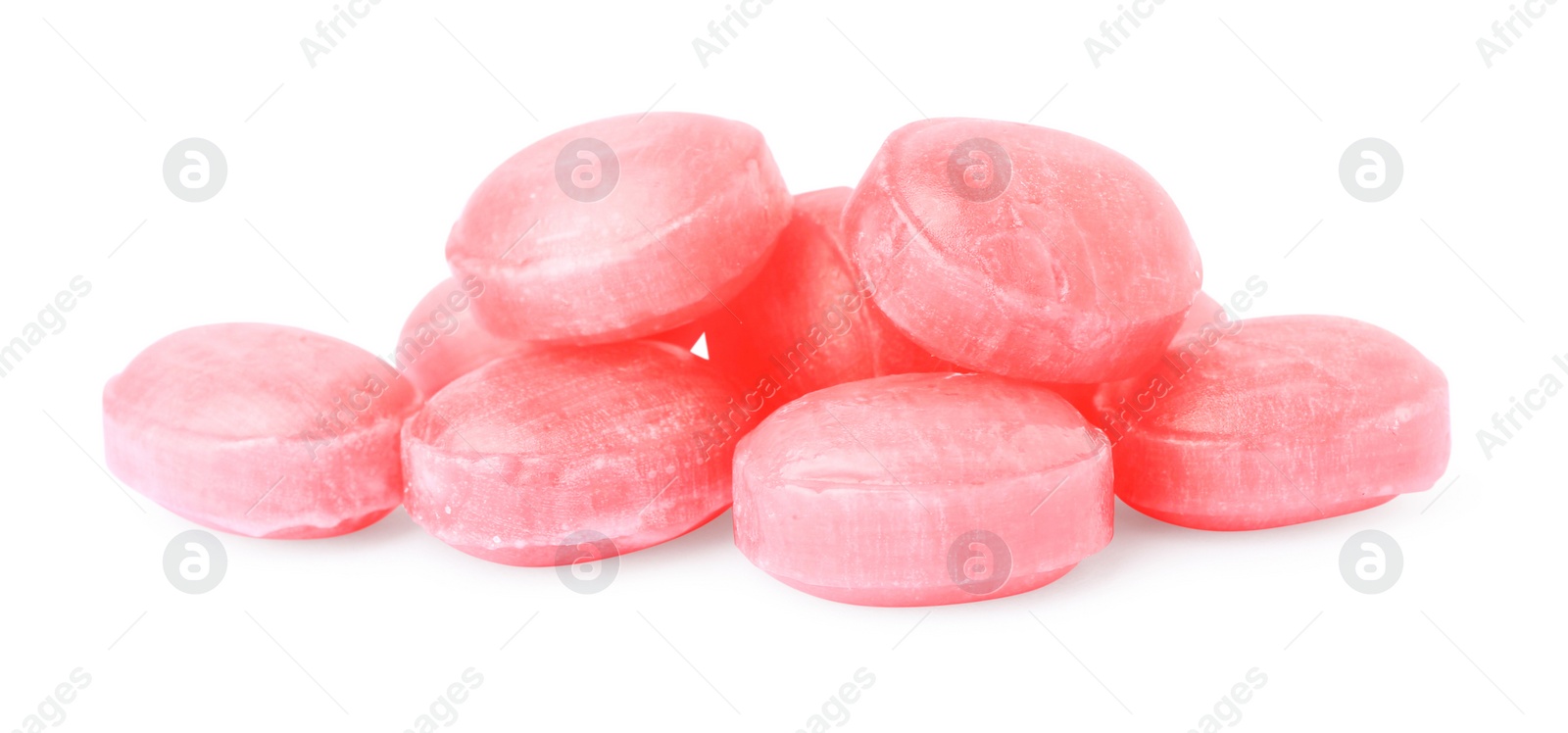 Photo of Many pink cough drops on white background