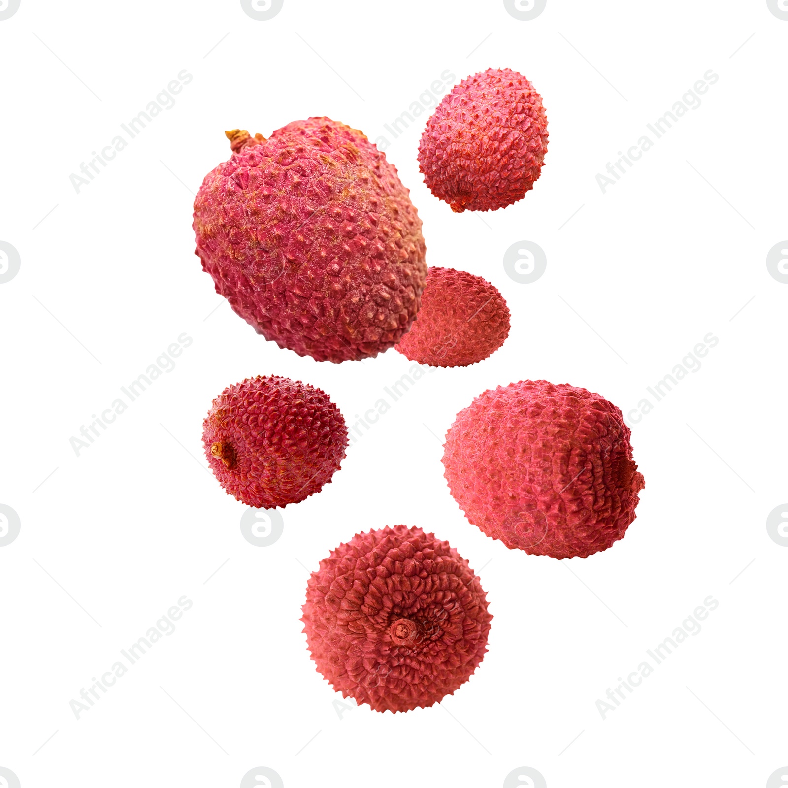 Image of Many lychees falling on white background. Exotic fruit