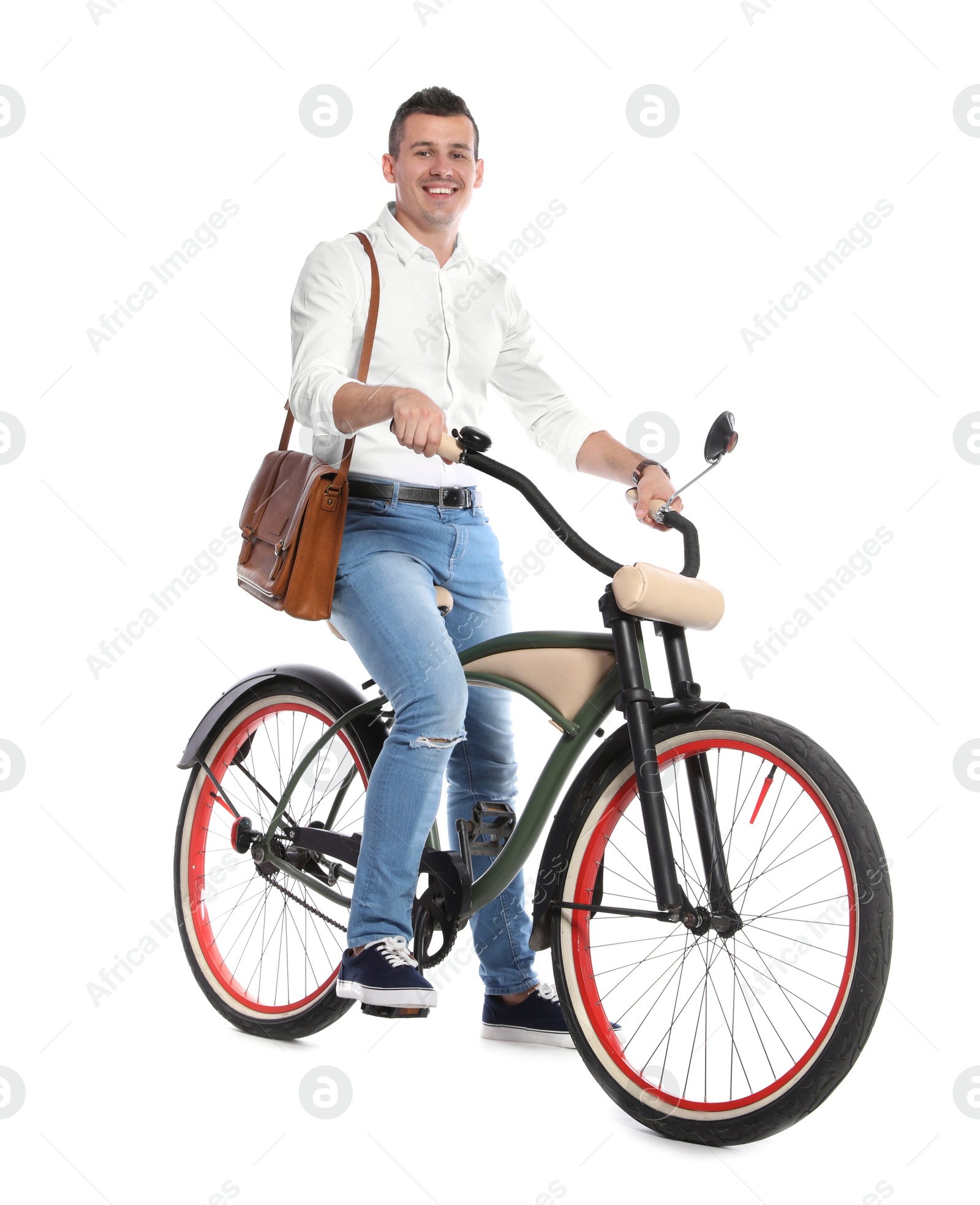 Photo of Portrait of handsome man with bicycle on white background