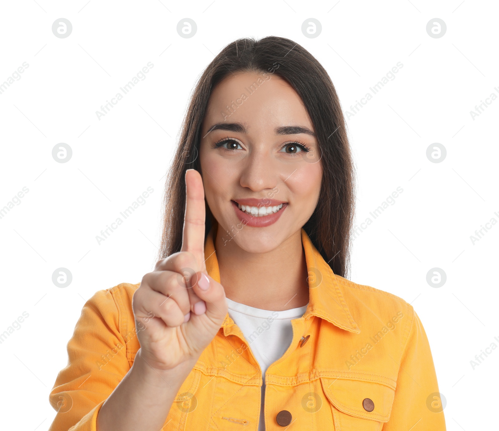 Photo of Woman in yellow jacket showing number one with her hand on white background