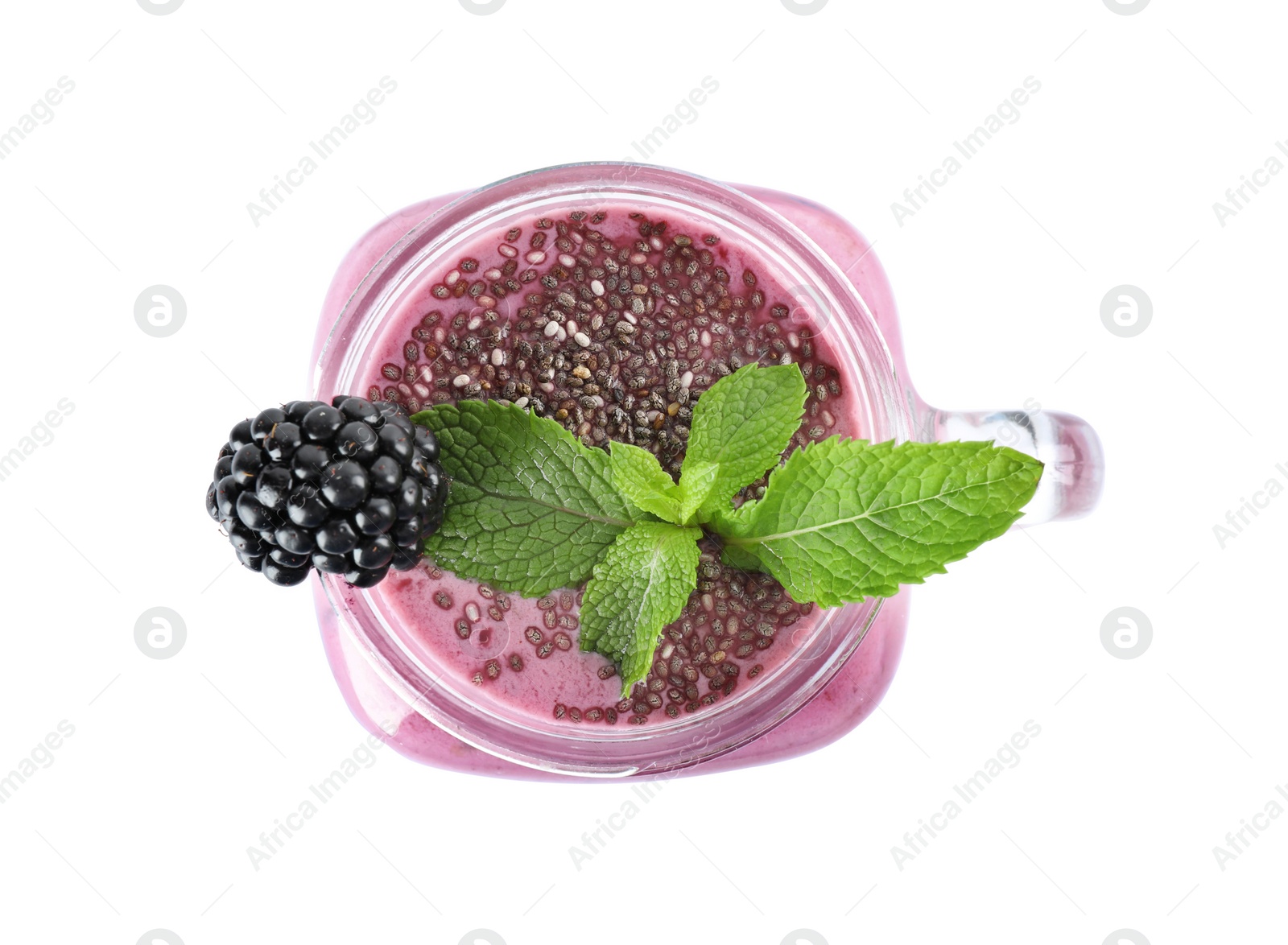 Photo of Delicious blackberry smoothie in mason jar on white background, top view