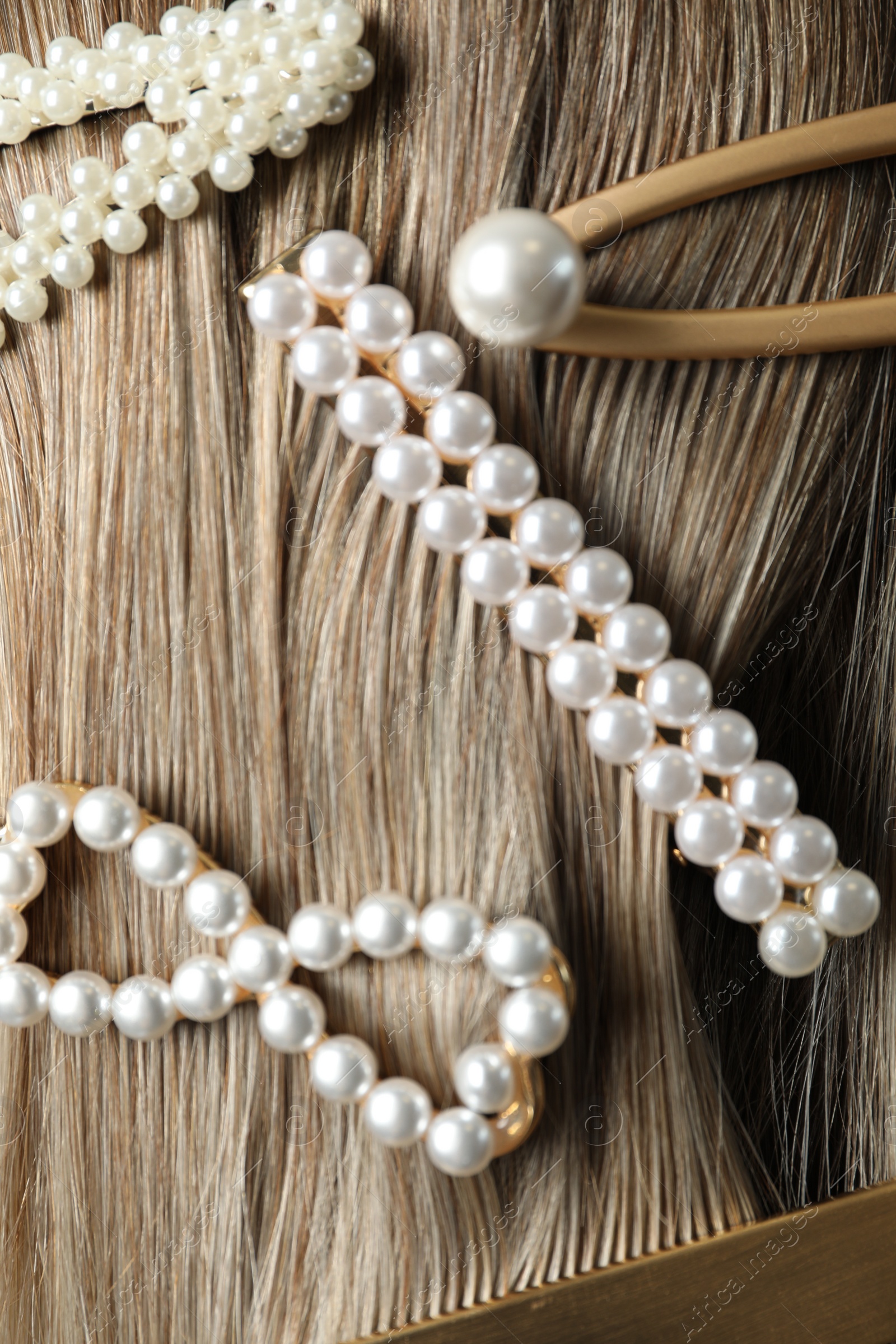 Photo of Woman with beautiful different hair clips, closeup