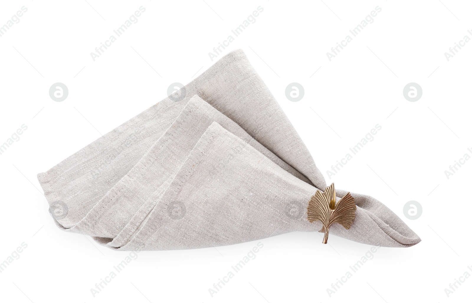 Photo of Napkin with decorative ring for table setting isolated on white