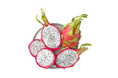 Delicious cut and whole dragon fruits (pitahaya) on white background, top view